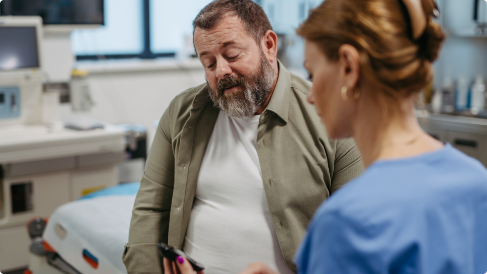 A patient and doctor discuss the benefits of an obesity clinical studies.
