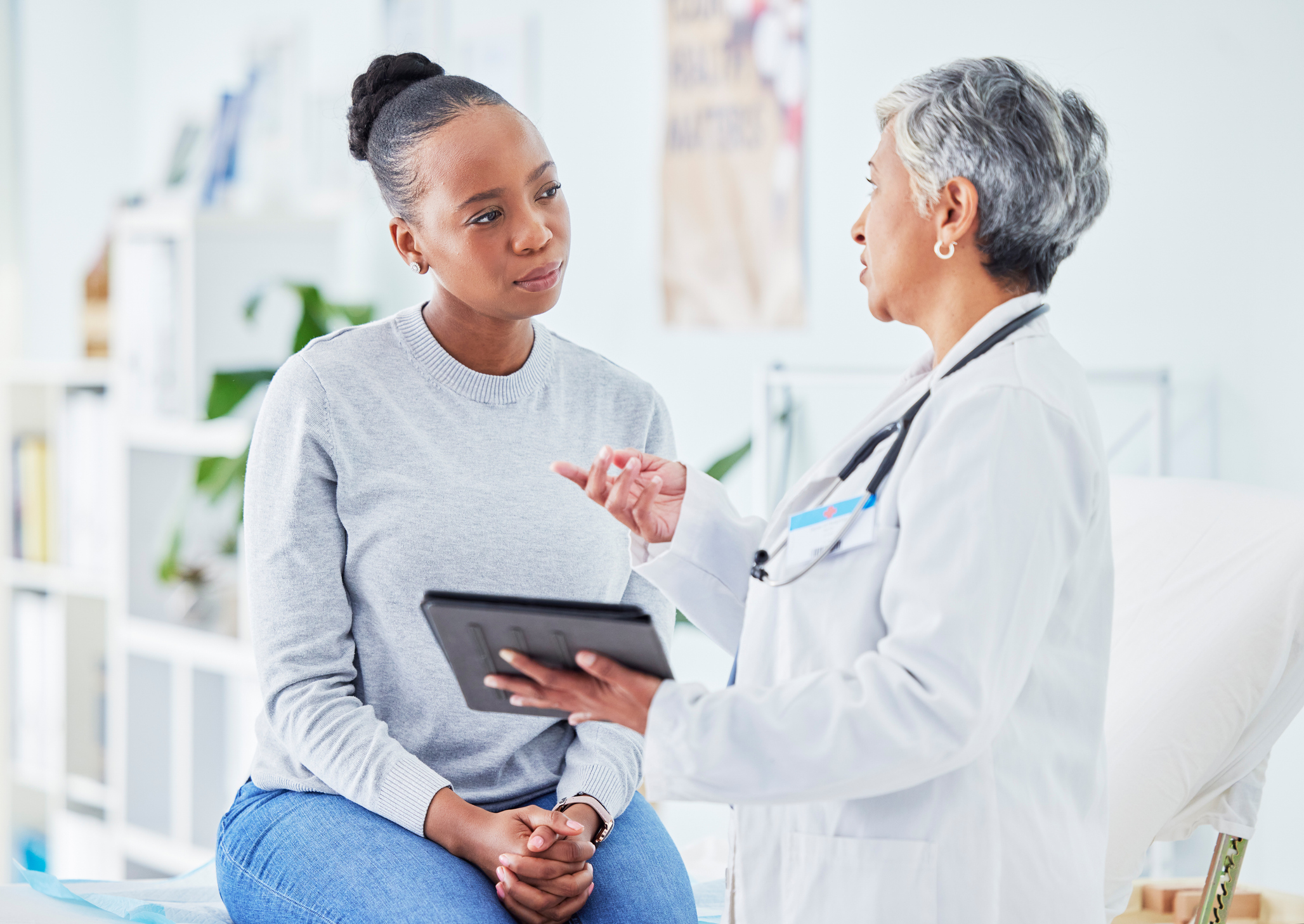 A doctor and a patient discuss how to sign up for clinical studies and the potential benefits of a study.