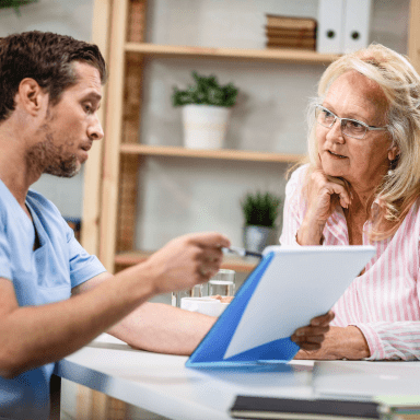 Doctor showing treatment results to a patient